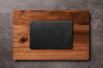 slate on wooden cutting board