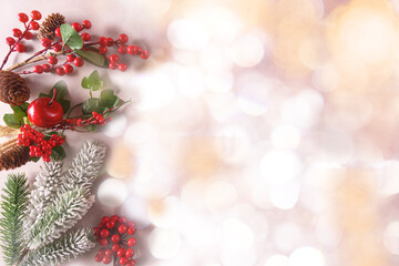 Fototapeta na wymiar Festive Christmas ornaments and decorations on light blurred background.