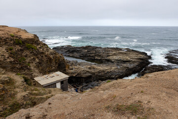 Shack at the rough coast of Pichilemu, Chile