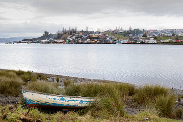 Chiloe stilt houses and their boats. Chile