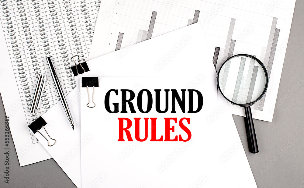 Aufkleber ground rules text on paper on chart background