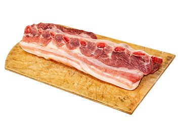 Obraz premium Raw pork ribs on wooden cutting board. Isolated.