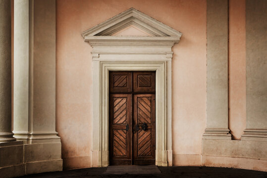 Round portico with door of the Empress Maria Theresa Entrance to the Rosenberg Palace . Prague Castle