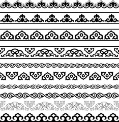 Set of seamless black ornamental borders. Buryatian, Mongolian ethnic style. So called «horned» ornament, «ram horns». Floral ornaments. Pattern brushes included.