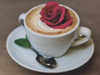 cup of coffee with rose