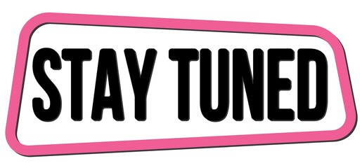 STAY TUNED text on pink-black trapeze stamp sign.