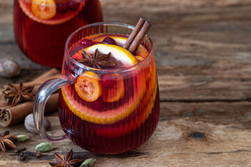Mulled wine with spices and orange. Traditional drink on winter holiday
