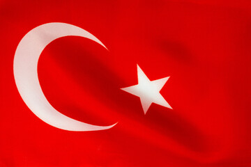 Obraz premium The waving flag of Turkey as a background. Close-up of the Turkish flag