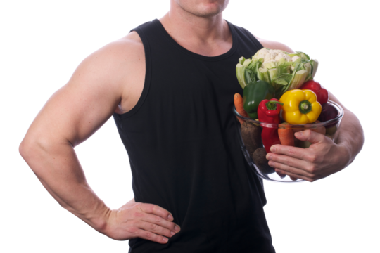 Strong, fit, muscular man holding a bowl of mixed vegetables under his left arm. Man is facing right. He is flexing his muscles. Transparent PNG