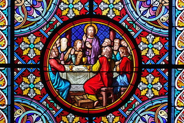 Basel Cathedral Minster. Stained glass window. The Last Supper is the final meal that Jesus shared...