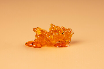 concentrated golden cannabis wax with a high THC content