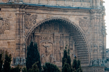 Detail of the facade of The Monastery of San Esteban in Salamanca during sunset