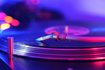 DJ Turntable with vinyl with music background