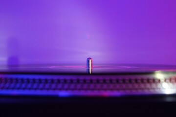 DJ Turntable with vinyl with music background