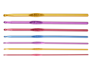 Colored hooks for wool knitting on white background