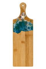 A narrow wooden cutting board, highlighted on a white background with an epoxy resin decoration