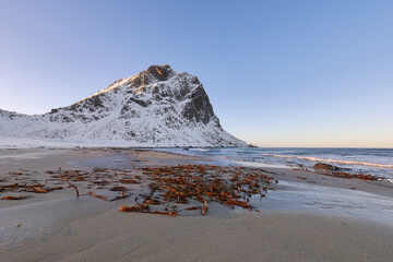Breathtaking winter scenery on Uttakleiv beach at morning