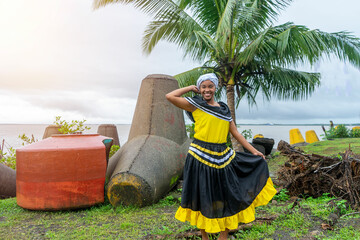 Afro-descendant woman wearing the typical costume of the Caribbean culture of Central America on the coast of El Bluff