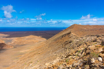 Dramatic landscape viewed from the top of Caldera Blanca volcano, Lanzarote, Canary Islands,  Spain