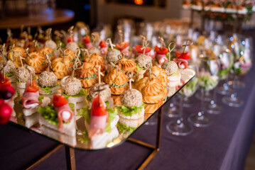 Food at a banquet for an aperitif. Presentation or wedding reception