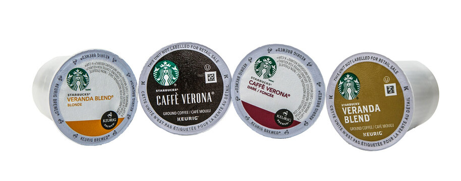 Four Starbucks  coffee capsules for Keurig coffee machine, transparent PNG.