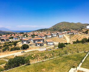 Fototapeta na wymiar Gökceada, Imbros Island city center view with buildings, Kaleköy village, Semadirek, Samothrace. It is the largest island in Turkey, in the north-northeast of the Aegean Sea.