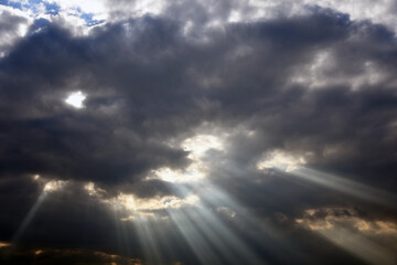 sun rays through clouds