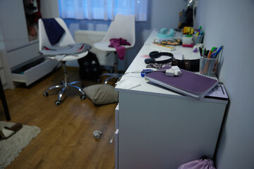 mess, disorder and interior concept - view of messy home kid's room with scattered stuff