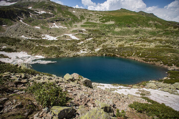 Naklejka na ściany i meble Alpine Lake in Caucasus Mountains