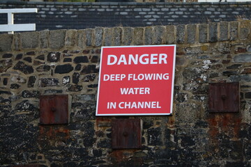Danger deep flowing  water in channel, Bude Bay Cornwall, Enland UK