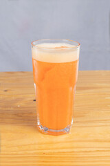 cocktail glass, on wood table