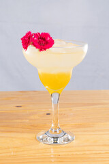 cocktail glass, on wood table