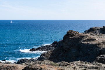 Fototapeta na wymiar Rocky cliff coastal landscape on a quiet sunny scene in Costa Brava, Mediterranean Sea