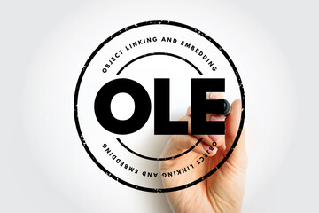 OLE Object Linking and Embedding - technology that allows embedding and linking to documents and other objects, acronym text stamp concept background