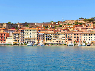 Naklejka na ściany i meble View from the sea to the city of Portoferraio, located on the island of Elba in Italy.