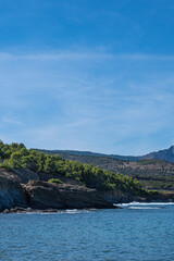 Naklejka premium Mountain landscape over the Mediterranean Sea Coast in Costa Brava under a blue sunny sky