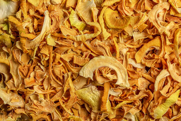 Dried onion or crunchy crunchy onion chips. Traditional seasoning in various culinary recipes. Food background.