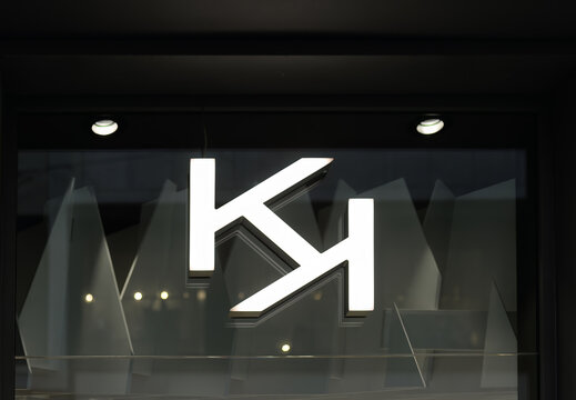 MILAN, ITALY &ndash; OCTOBER 6, 2022: Logo of Kiko Milano on shop window. This professional cosmetics brand from the Gruppo Percassi was founded in 1997 and has shops all over the world.