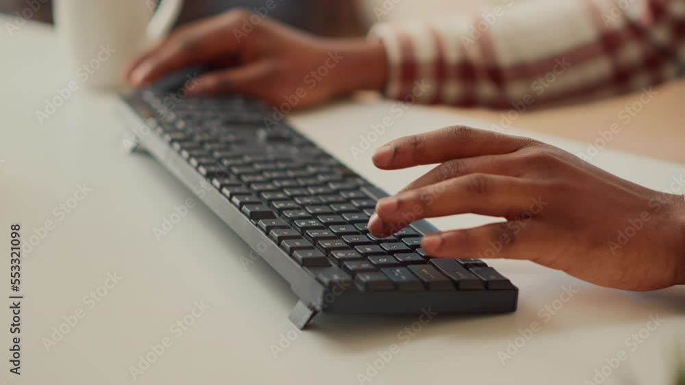 Poster young adult typing data to create report on computer, using keyboard to send professional email. fre