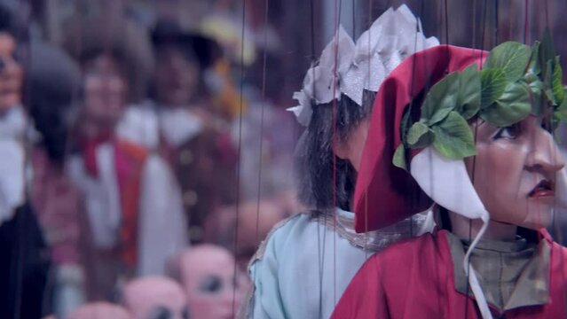 Wooden dolls. Papa Carlo. Pinocchio and Pinocchio. Woodworking industry. Puppet show. Figures of actors made of wood hang on ropes. Studio Colla in Italy Milan 12.2022