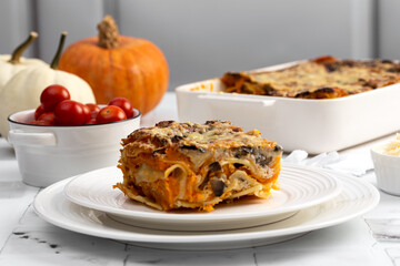 Pumpkin homemade lasagna on the kitchen table