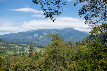 view to karavenke mountain range and stol veliki hochstuhl mountain in alps slovenia and austria - obrazy, fototapety, plakaty
