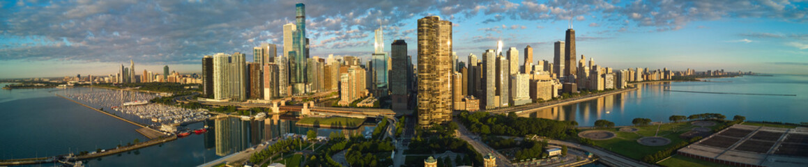 Fototapeta na wymiar Wide panorama of Chicago city skyline from aerial view at Navy Pier during sunrise