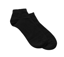 Pair of black socks on white background, top view