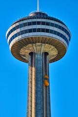 Fototapeta na wymiar Elevator going up huge Skylon Tower in Canada by Niagara Falls