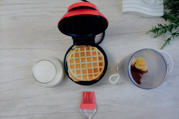 Waffle maker with mini waffles with stand and mini studio props.