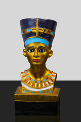 statue made of basalt stone, glass and metal dating back to the Pharaonic era