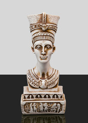 statue made of basalt stone, glass and metal dating back to the Pharaonic era