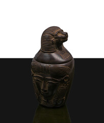 statue made of basalt stone, glass and metal dating back to the Pharaonic era