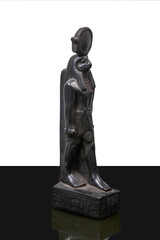 statue made of basalt stone, glass and metal dating back to the Pharaonic era